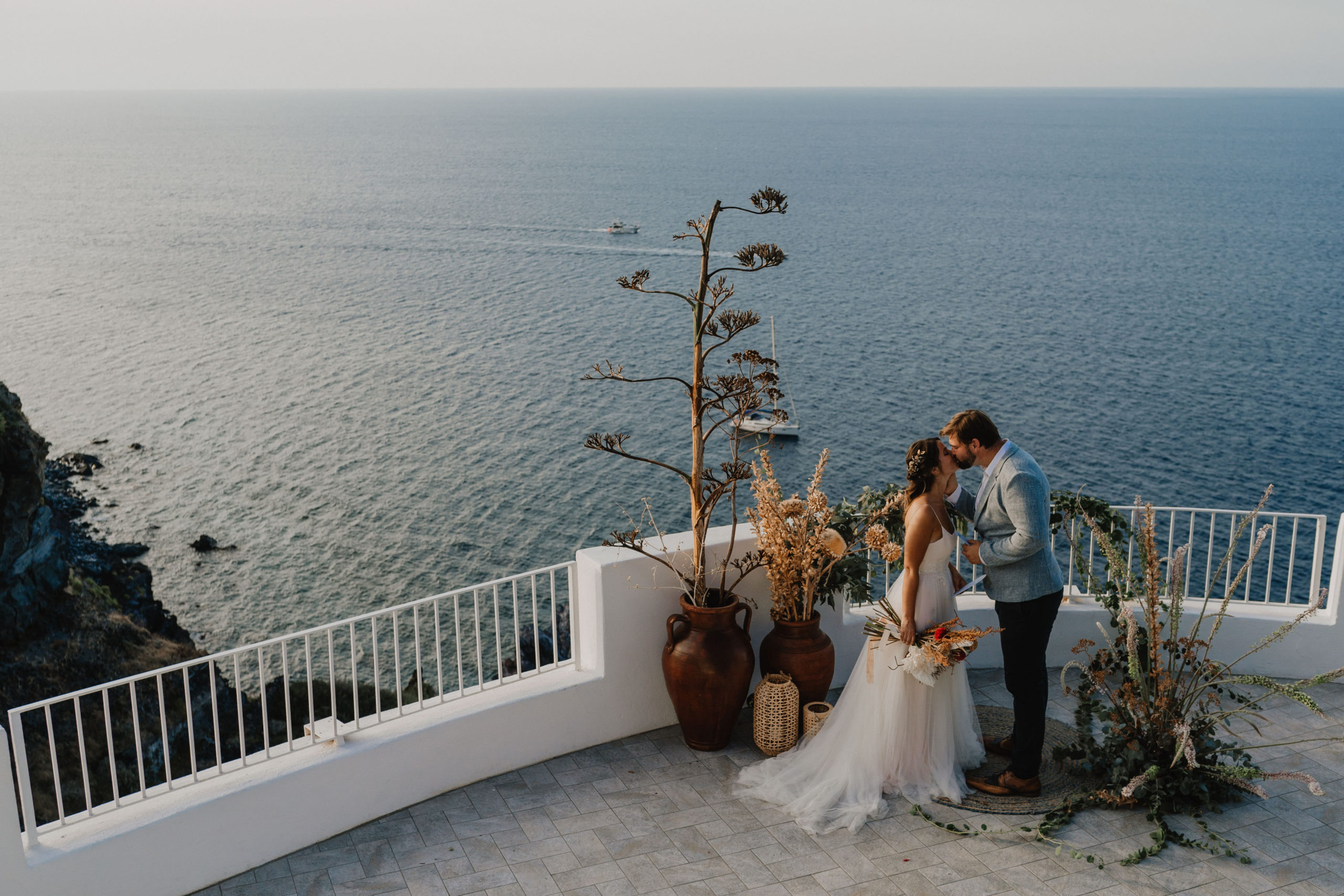 Destination Wedding Planning Guide. Couple kissing during their elopement ceremony in Italy..